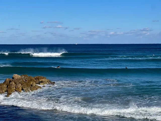 a view of water heater and wooden floor