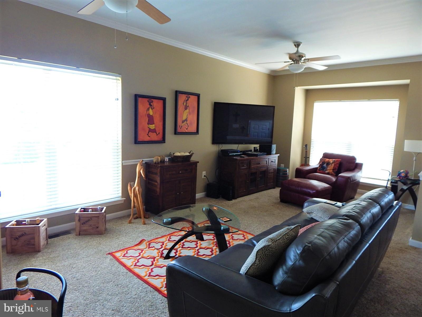 360 Snyder Lane Culpeper, VA 22701 - Photo 2 of 19 a living room with furniture and a flat screen tv
