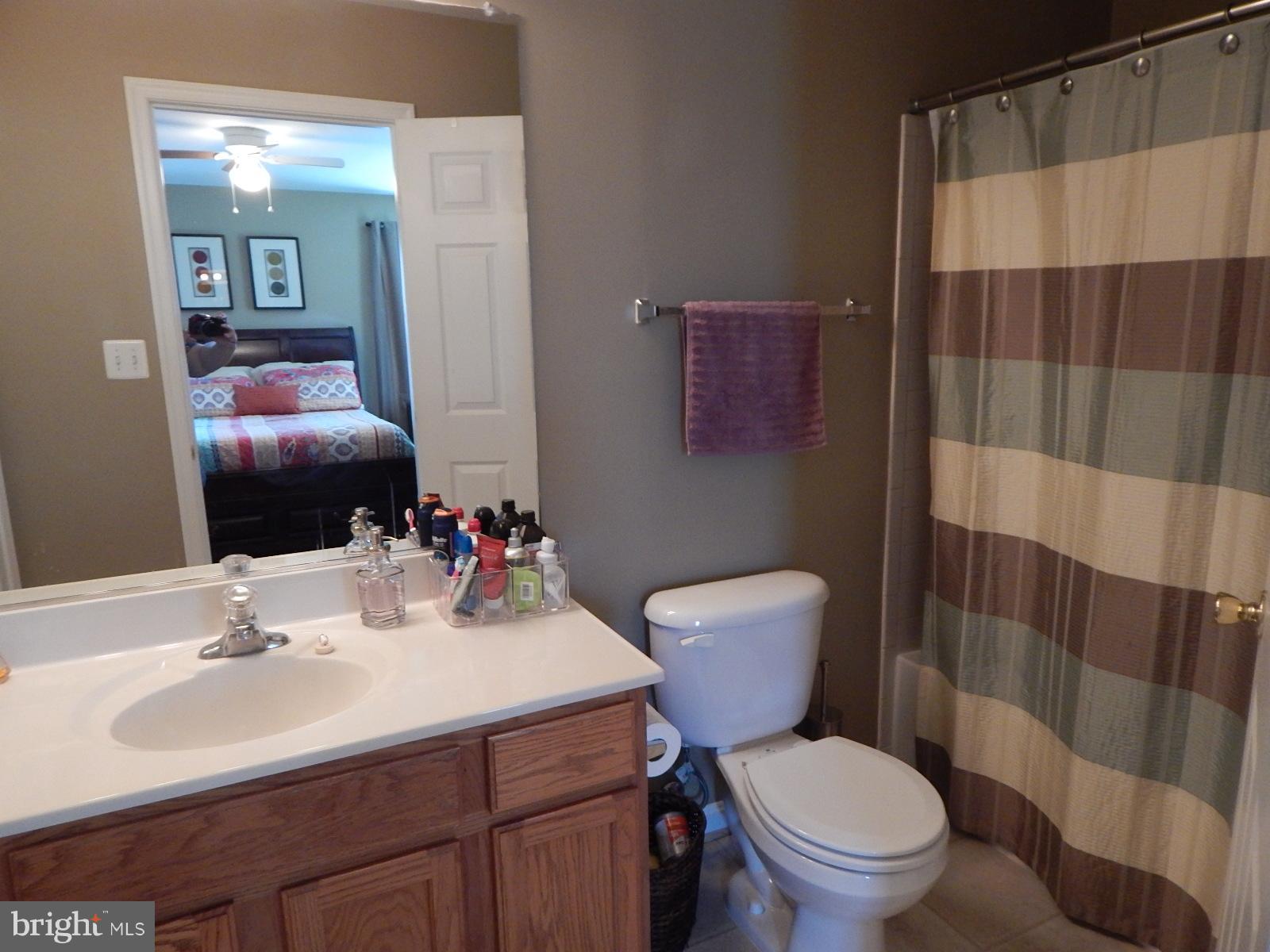 360 Snyder Lane Culpeper, VA 22701 - Photo 11 of 19 a bathroom with a sink toilet and shower