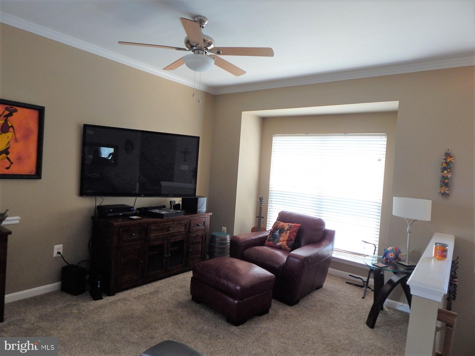 360 Snyder Lane Culpeper, VA 22701 - Photo 3 of 19 a living room with furniture and a flat screen tv