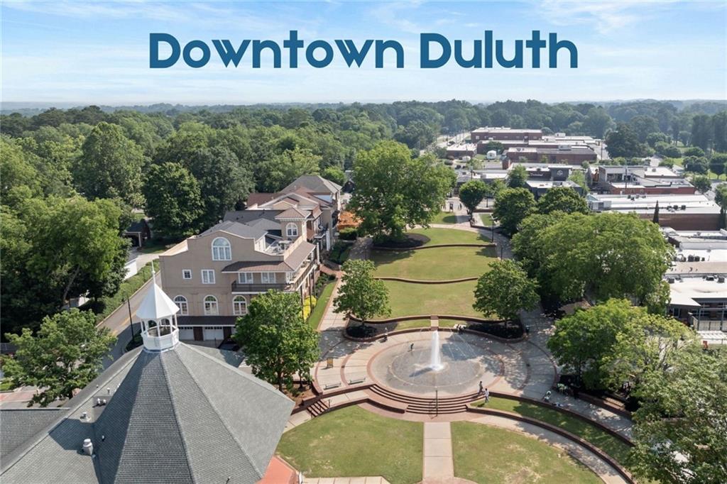 3334 Swallowtail Terrace Duluth, GA 30096 - Photo 11 of 37 an aerial view of a house swimming pool and garden