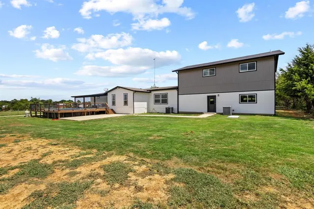 a front view of house with garden