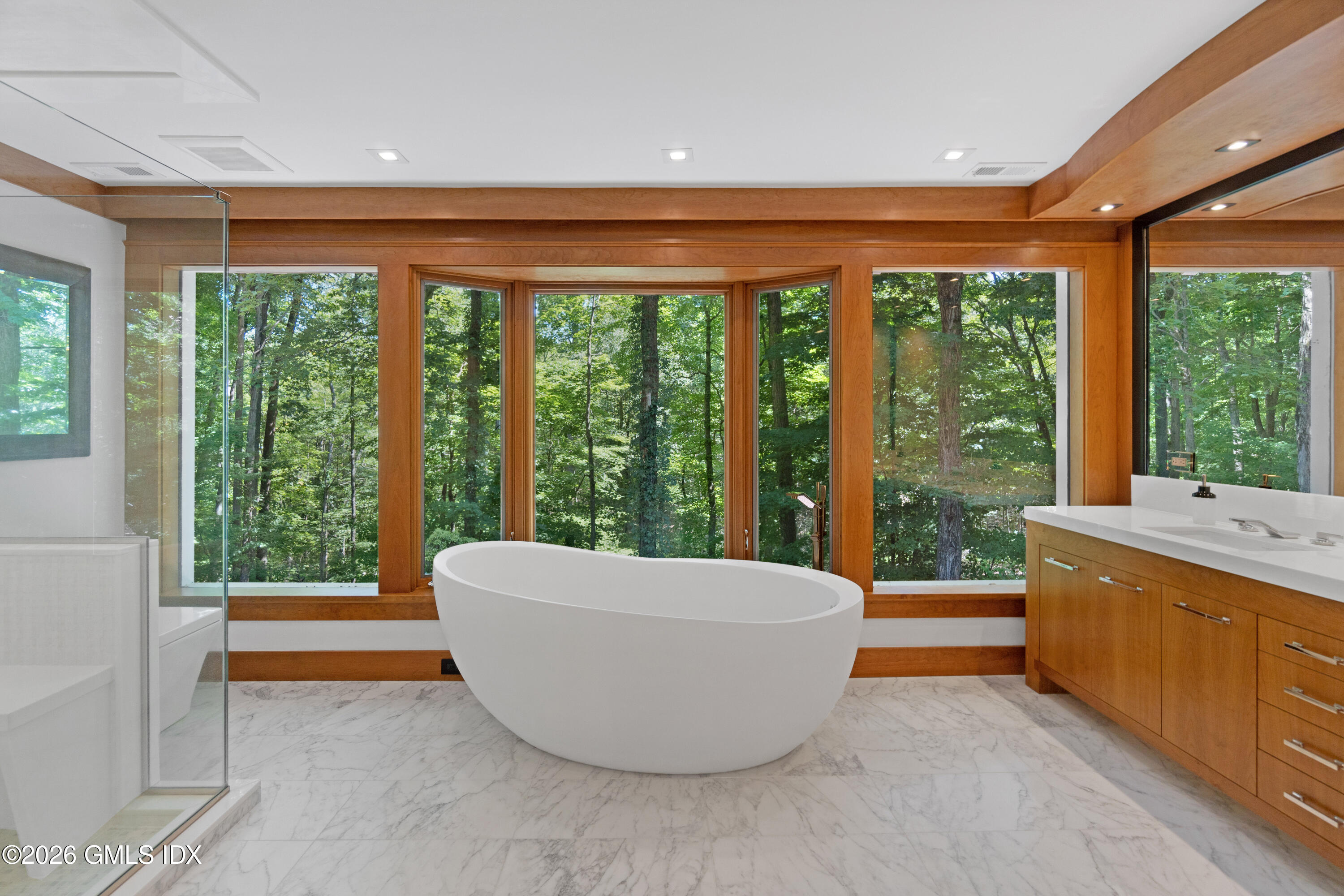 386 Taconic Road Greenwich, CT 06831 - Photo 12 of 22 a view of an empty room with a large window