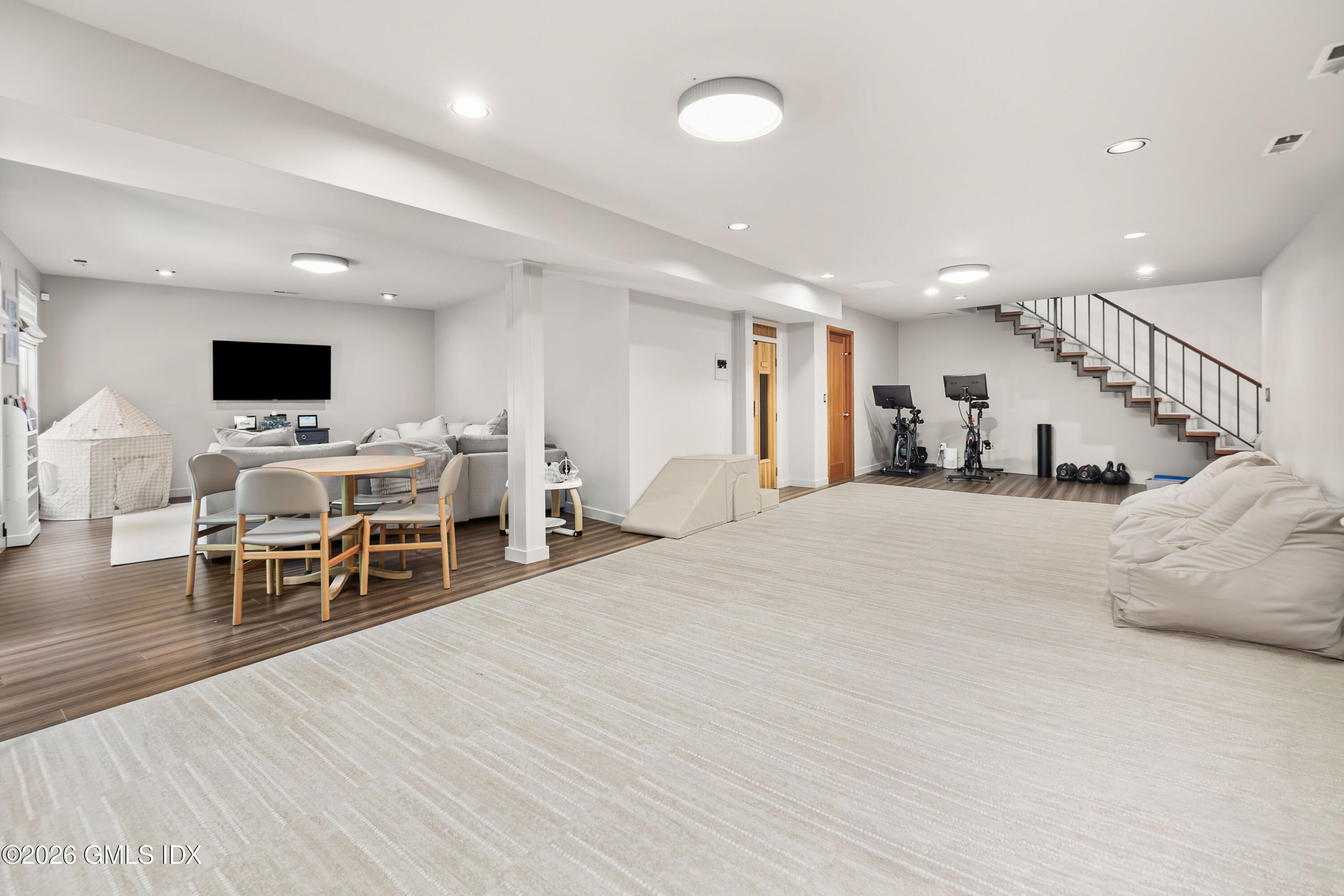 386 Taconic Road Greenwich, CT 06831 - Photo 15 of 22 a living room with furniture and a flat screen tv