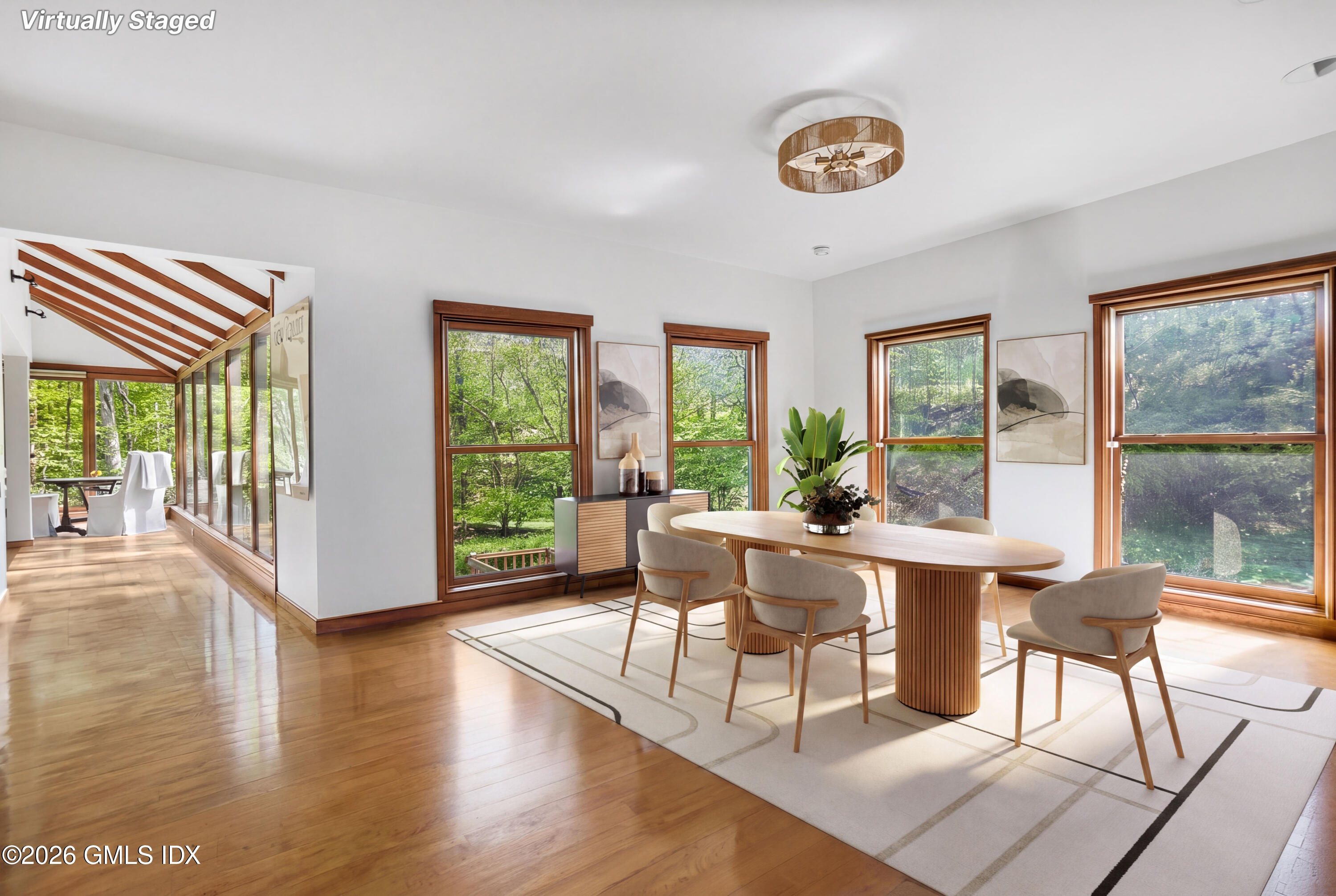 386 Taconic Road Greenwich, CT 06831 - Photo 8 of 22 a workspace with wooden floor and windows