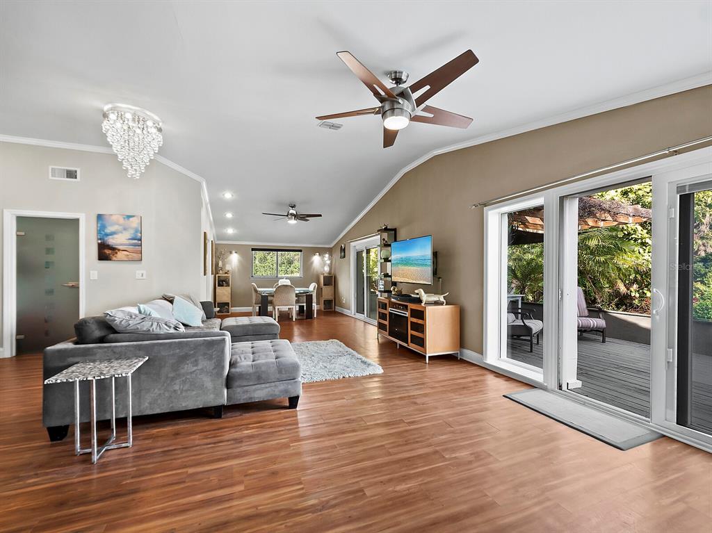 5645 Churchill Downs Road Sarasota, FL 34241 - Photo 12 of 41 a living room with furniture and a large window