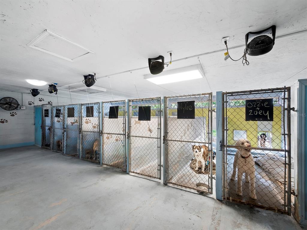 5645 Churchill Downs Road Sarasota, FL 34241 - Photo 36 of 41 a view of a livingroom with furniture a flat screen tv