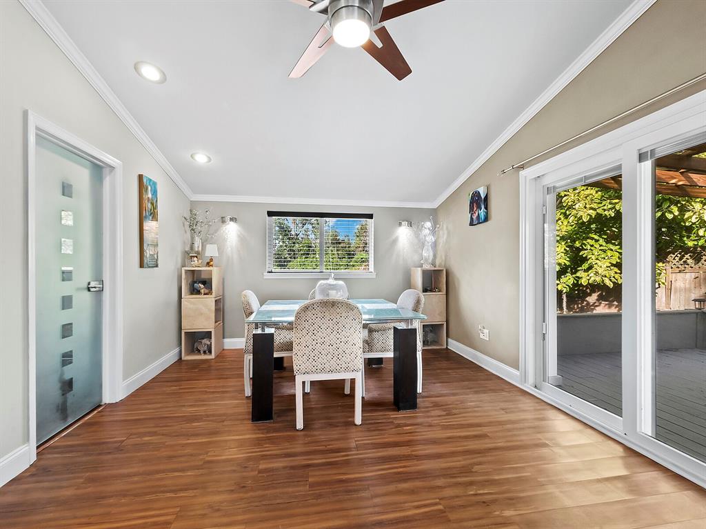 5645 Churchill Downs Road Sarasota, FL 34241 - Photo 10 of 41 a view of a dining room with furniture and wooden floor
