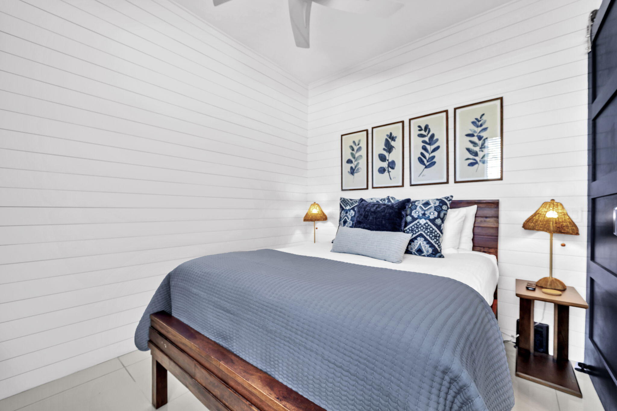 613 Eastern Lake Road, Unit 3 Santa Rosa Beach, FL 32459 - Photo 18 of 38 a bedroom with a bed and wall painting