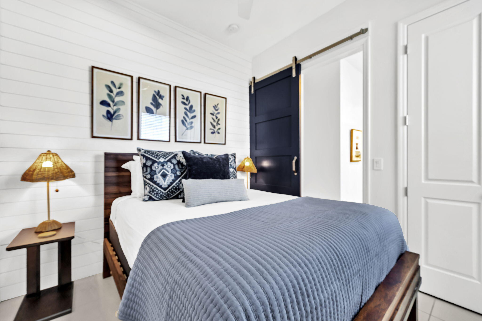 613 Eastern Lake Road, Unit 3 Santa Rosa Beach, FL 32459 - Photo 19 of 38 a bedroom with a bed and a painting on the wall