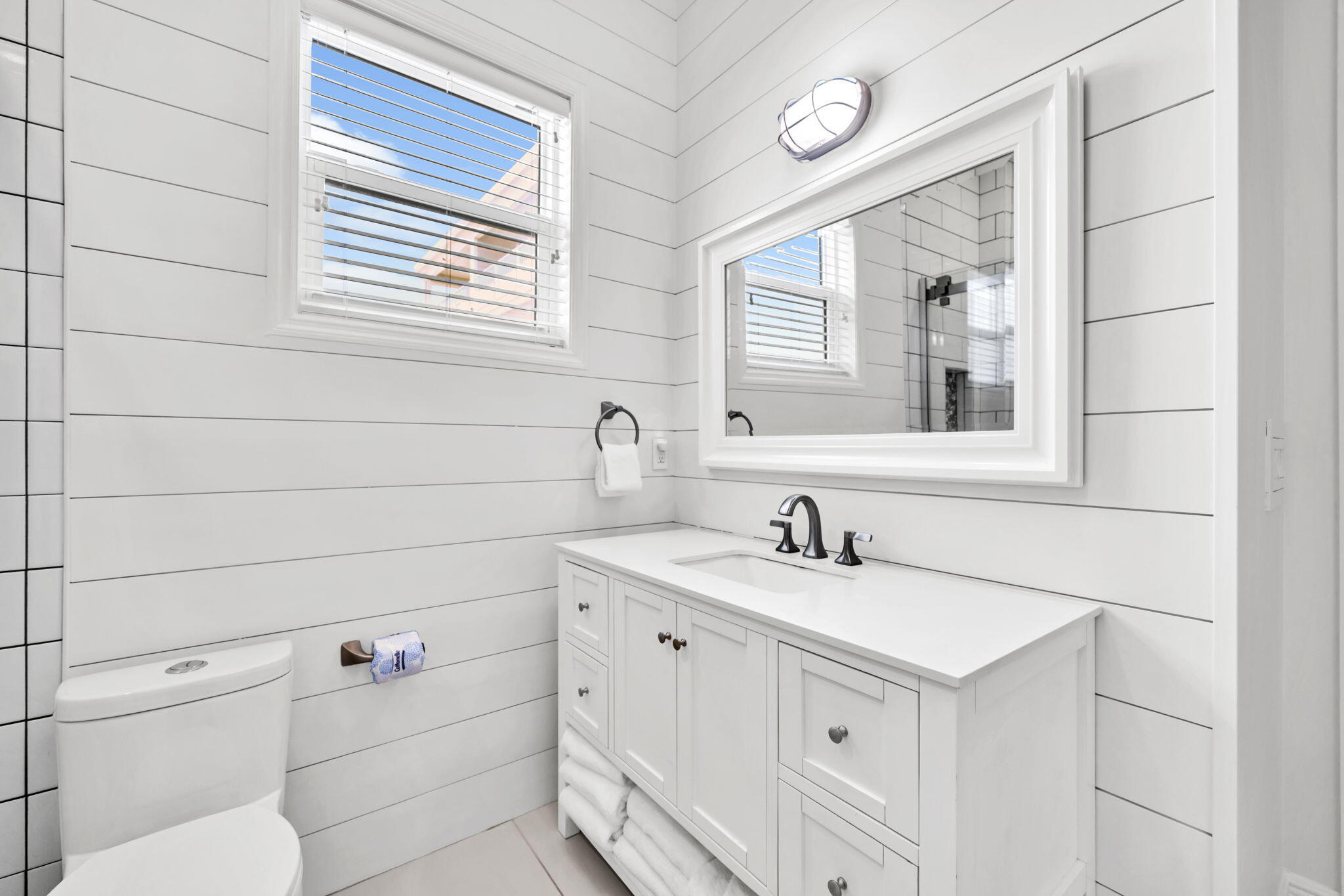 613 Eastern Lake Road, Unit 3 Santa Rosa Beach, FL 32459 - Photo 24 of 38 a bathroom with a sink and a toilet