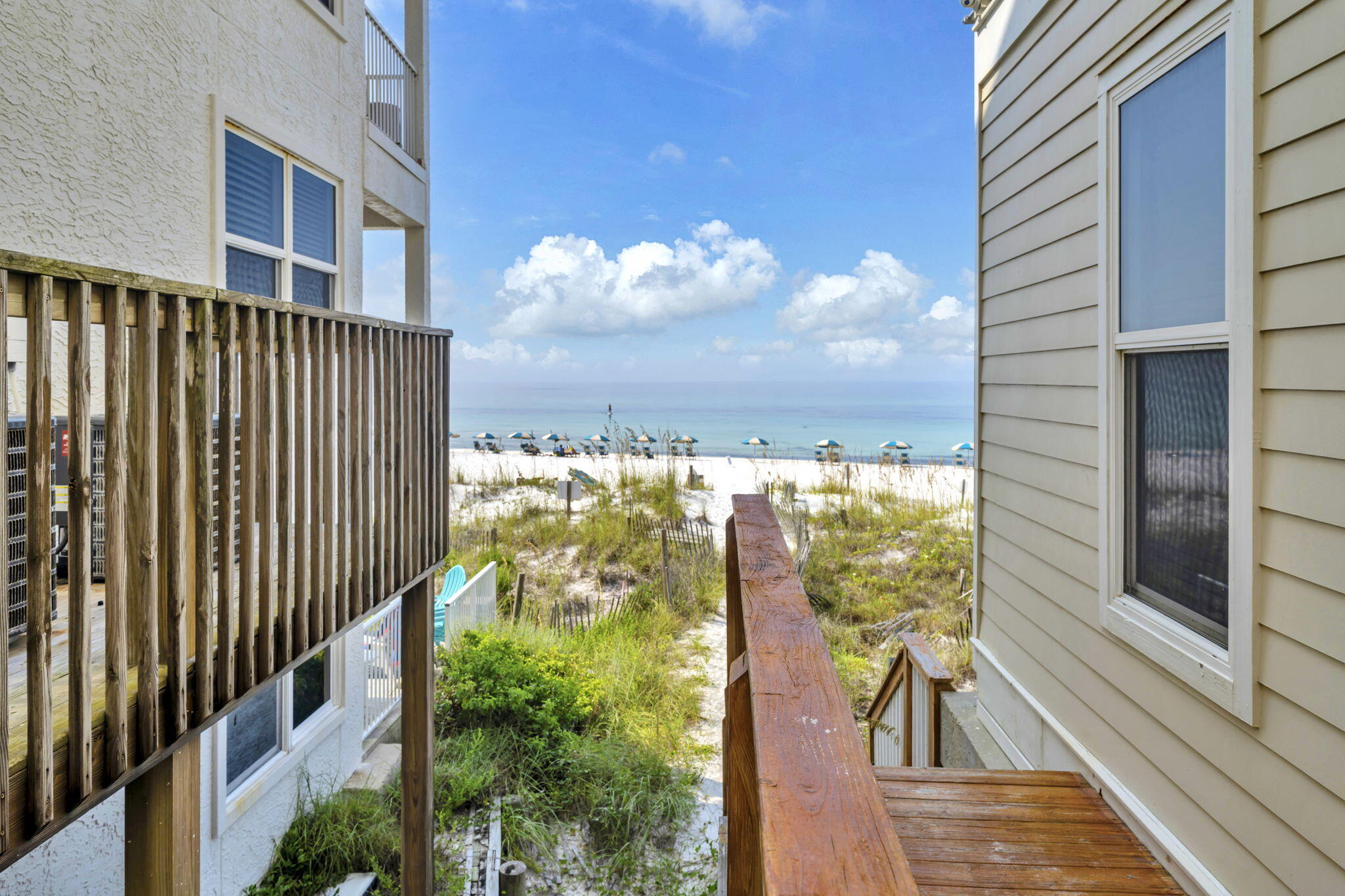613 Eastern Lake Road, Unit 3 Santa Rosa Beach, FL 32459 - Photo 37 of 38 a view of a balcony with wooden floor