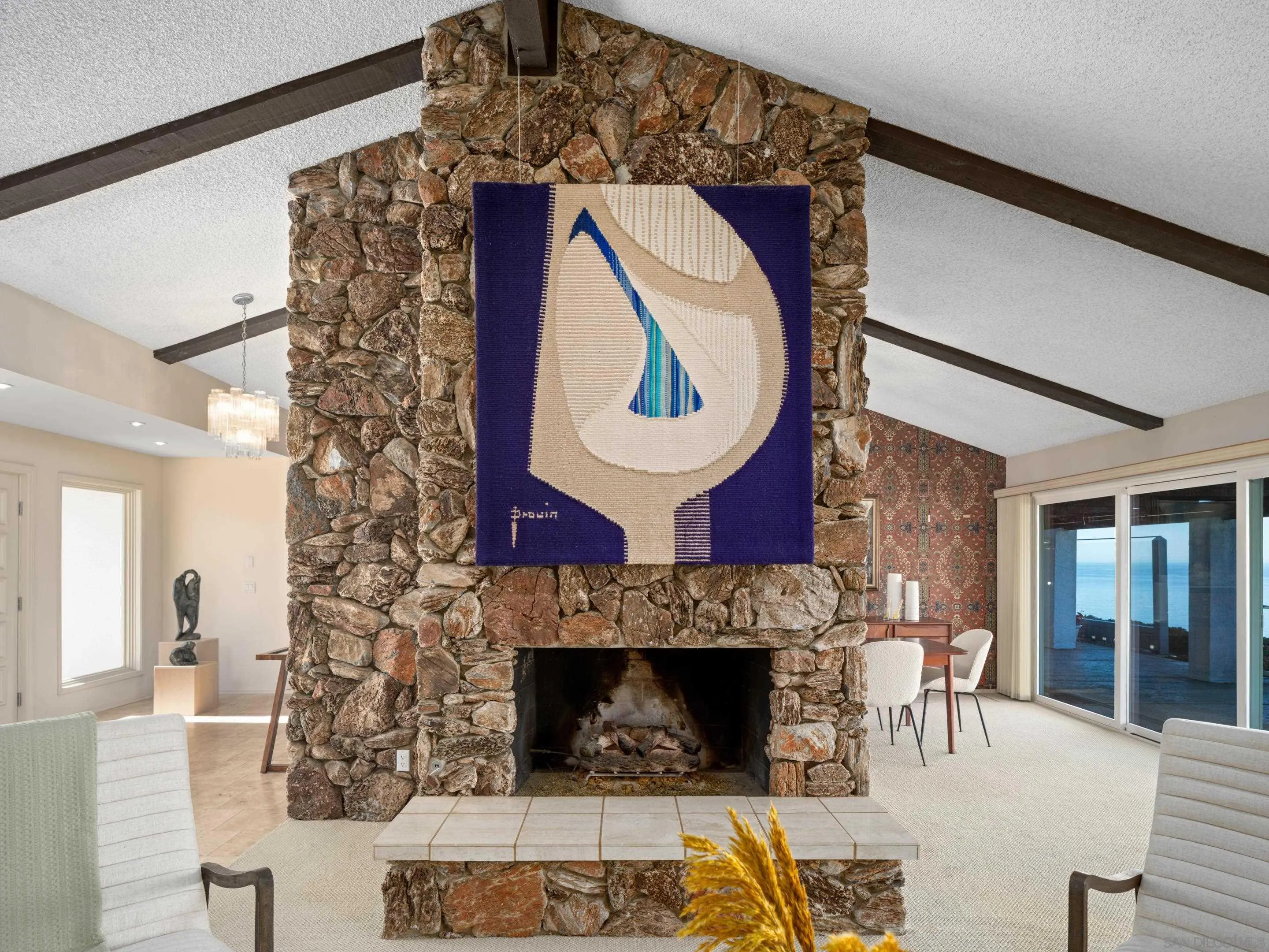 8568 Prestwick Drive La Jolla, CA 92037 - Photo 11 of 39 a view of livingroom with furniture and fireplace