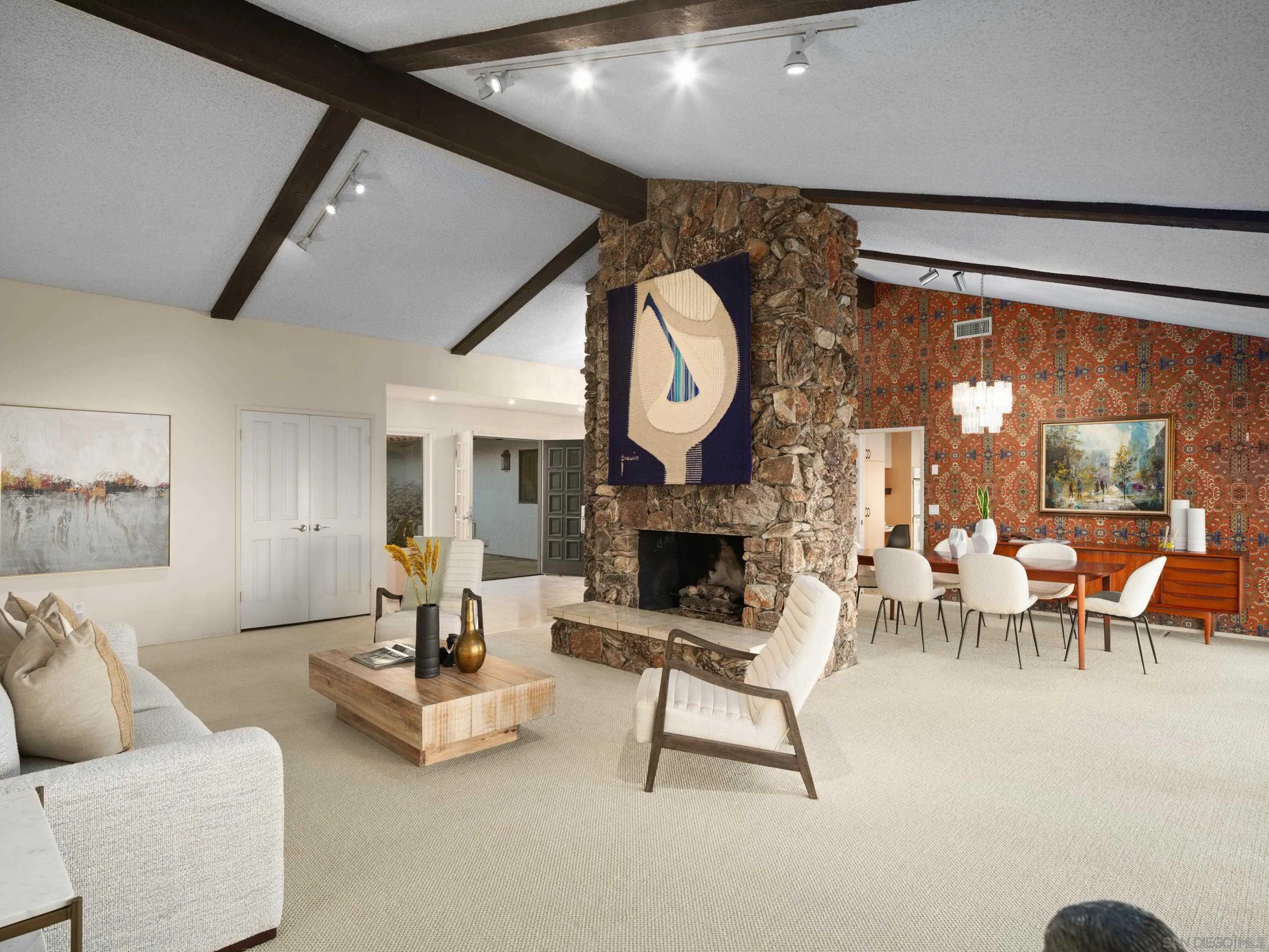 8568 Prestwick Drive La Jolla, CA 92037 - Photo 12 of 39 a living room with furniture and a fireplace