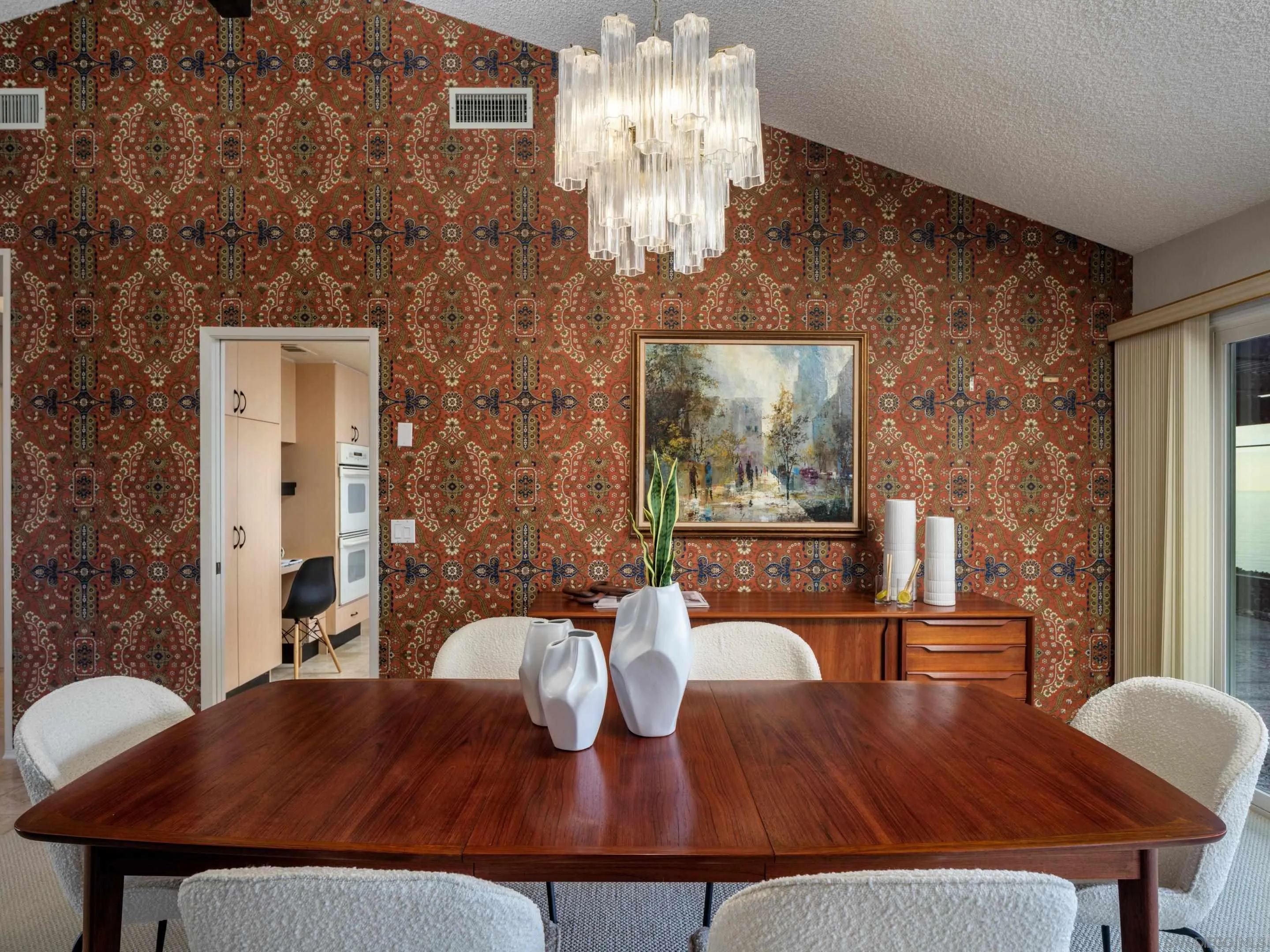 8568 Prestwick Drive La Jolla, CA 92037 - Photo 13 of 39 a view of a dining room with furniture and wooden floor