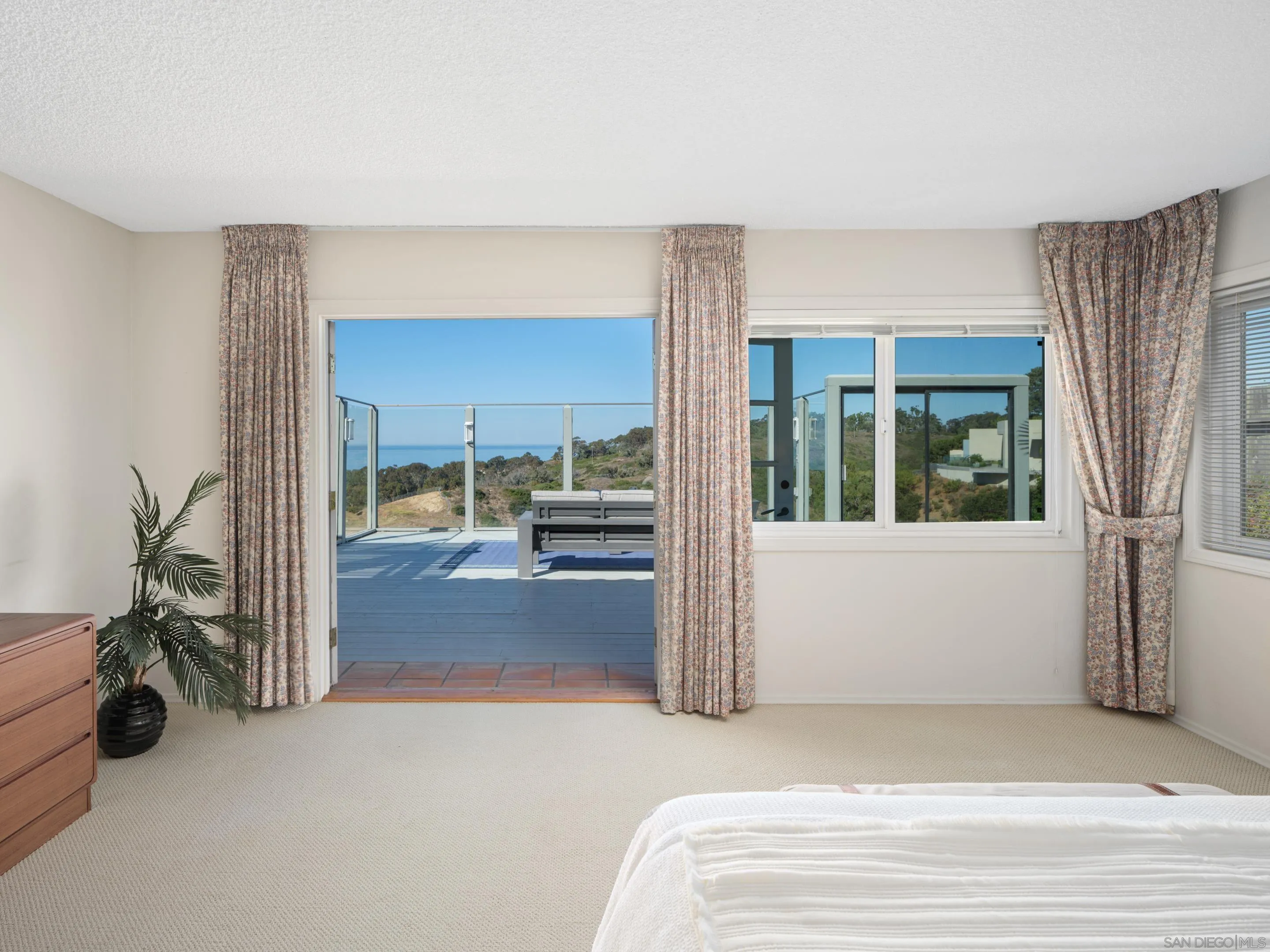 8568 Prestwick Drive La Jolla, CA 92037 - Photo 20 of 39 a view of livingroom with furniture and a window