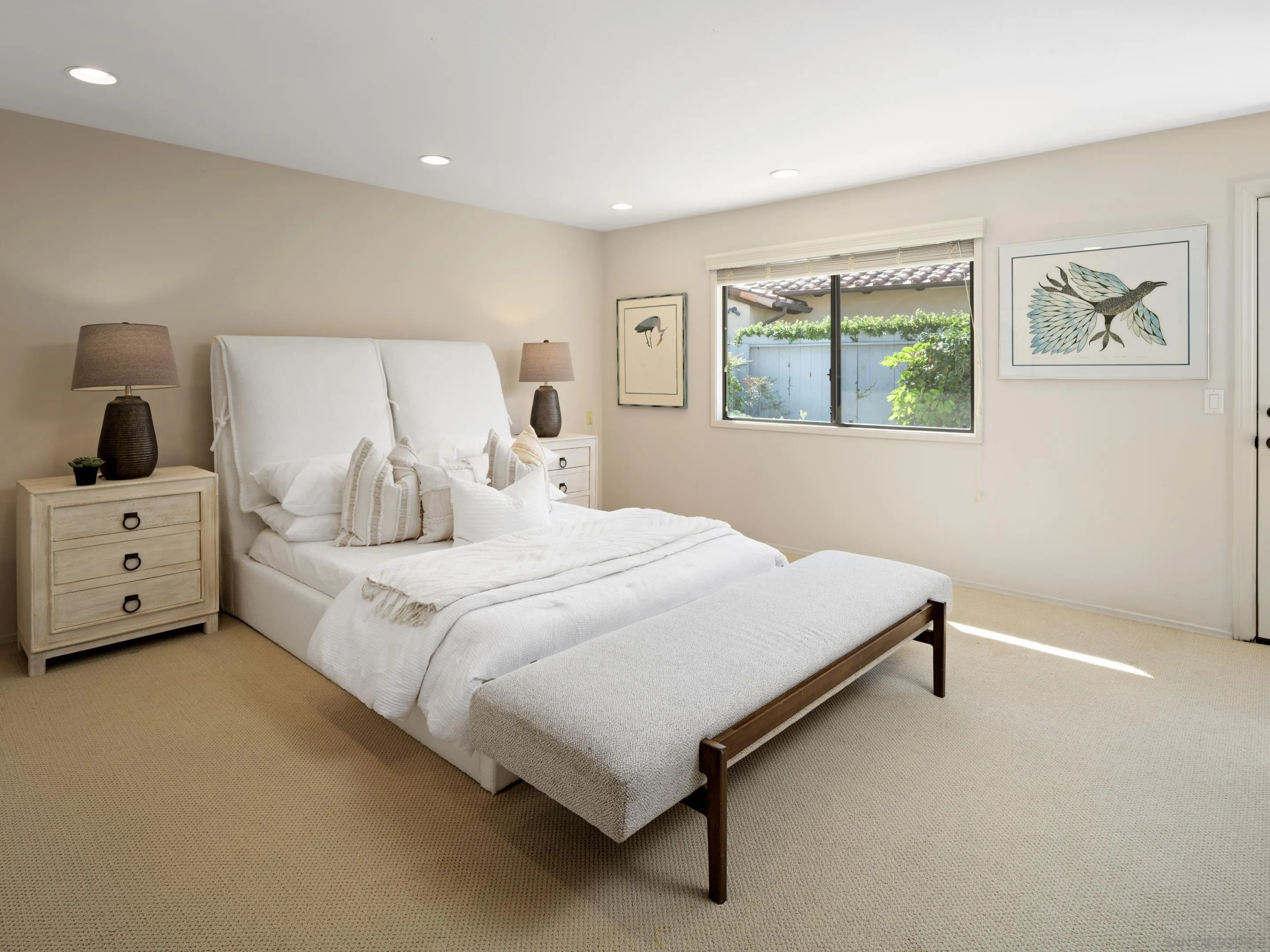 8568 Prestwick Drive La Jolla, CA 92037 - Photo 28 of 39 a bedroom with a bed and a cabinets
