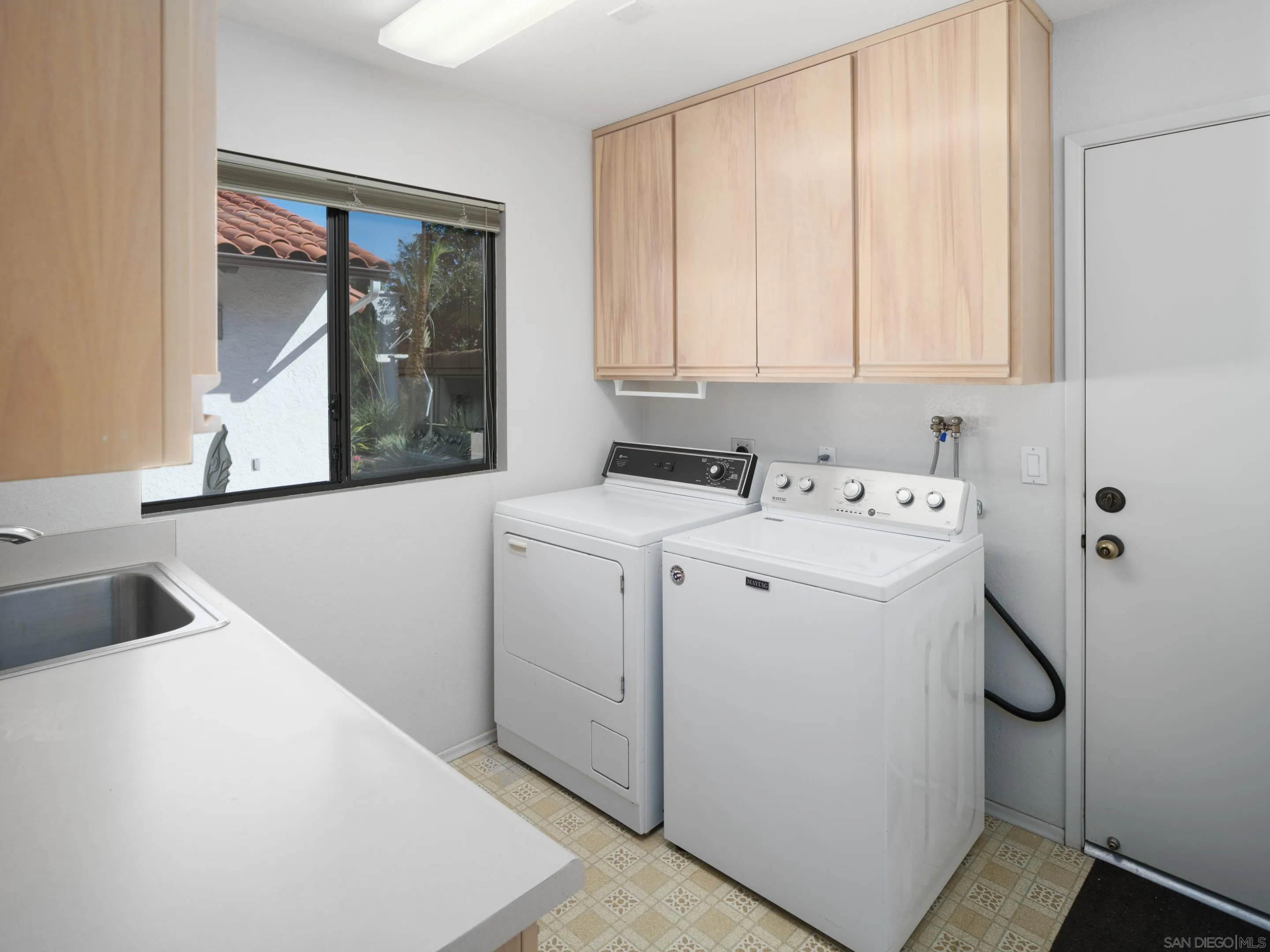 8568 Prestwick Drive La Jolla, CA 92037 - Photo 36 of 39 a utility room with dryer and washer