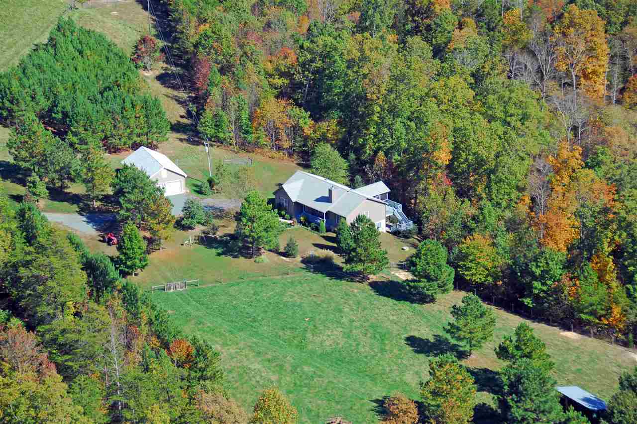 1452 Courthouse Road Palmyra, VA 22963 - Photo 1 of 44 an aerial view of residential house with outdoor space and trees all around