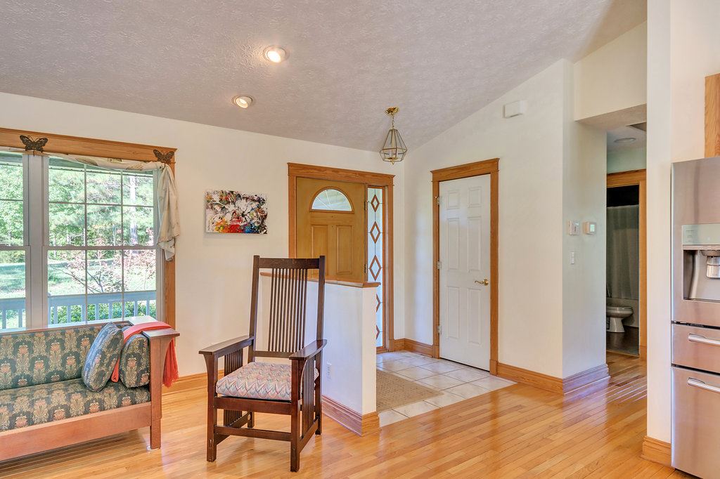 1452 Courthouse Road Palmyra, VA 22963 - Photo 17 of 44 a living room with furniture and a large window