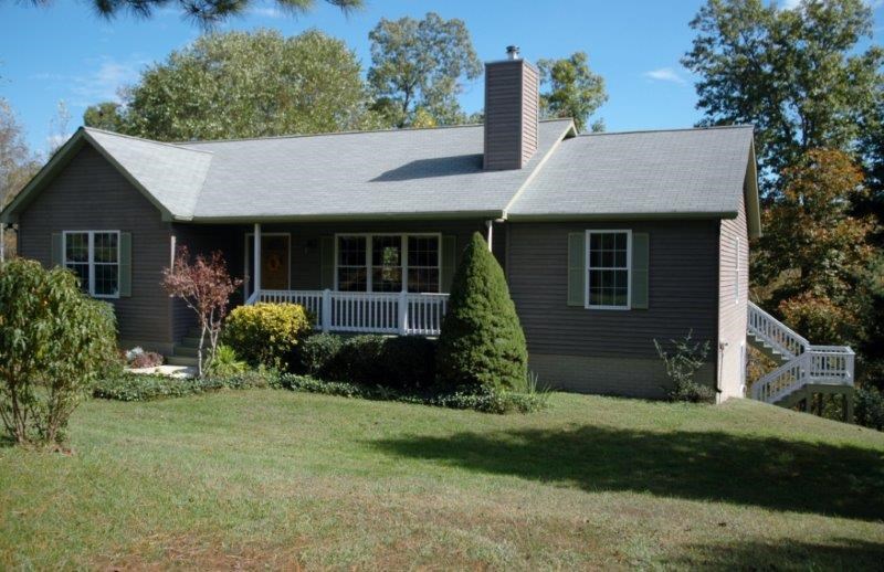 1452 Courthouse Road Palmyra, VA 22963 - Photo 2 of 44 a front view of house with a garden