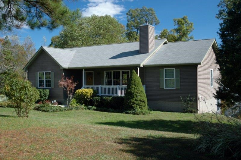 1452 Courthouse Road Palmyra, VA 22963 - Photo 3 of 44 a front view of a house with garden