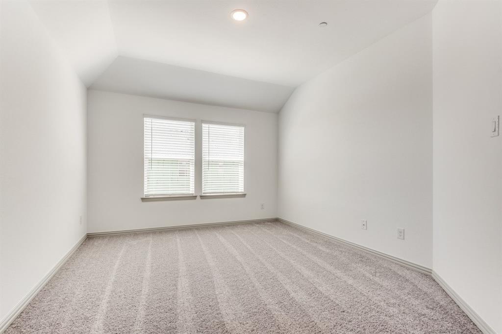 8913 Swallowtail Street Frisco, TX 75035 - Photo 15 of 38 an empty room with a window