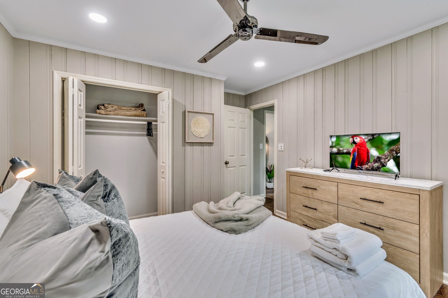 597 South Gordon Road Southwest Mableton, GA 30126 - Photo 11 of 25 a bedroom with a bed and wooden floor