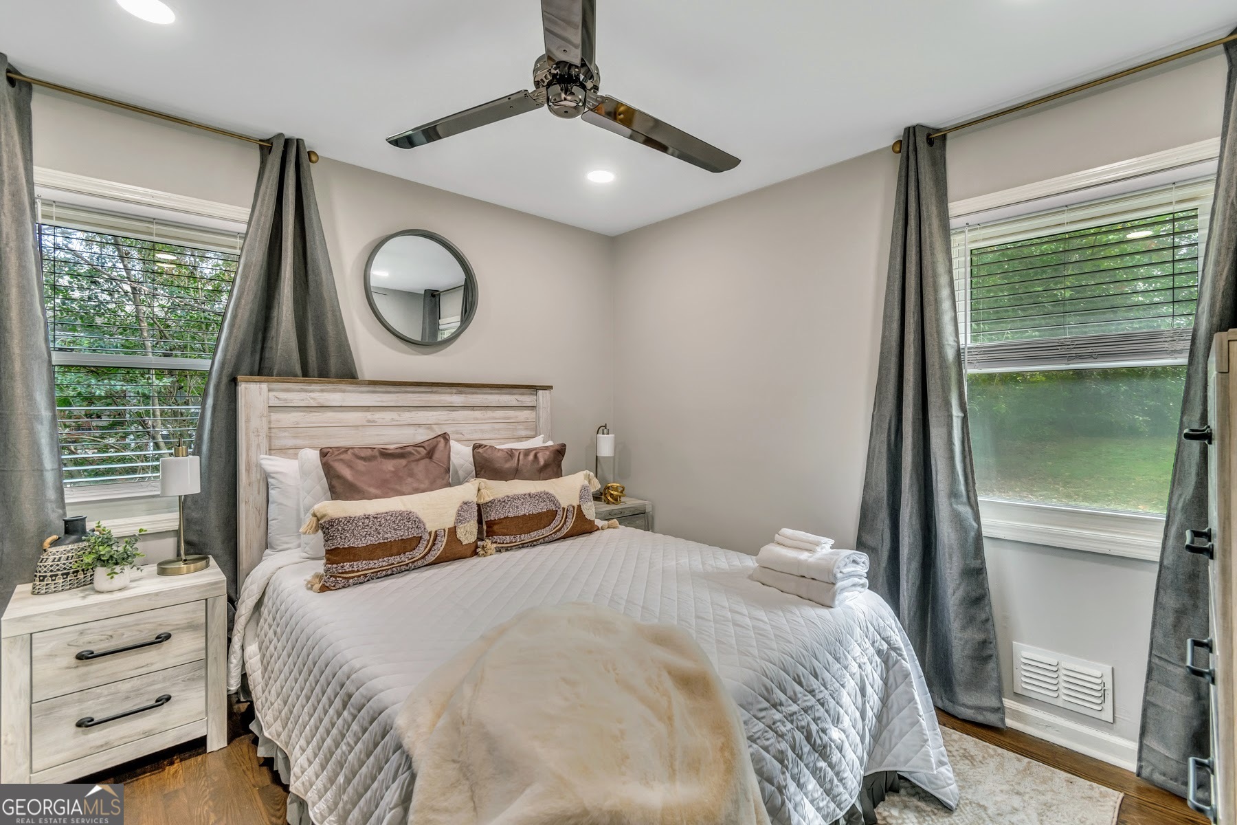 597 South Gordon Road Southwest Mableton, GA 30126 - Photo 17 of 25 a bedroom with a bed and a window