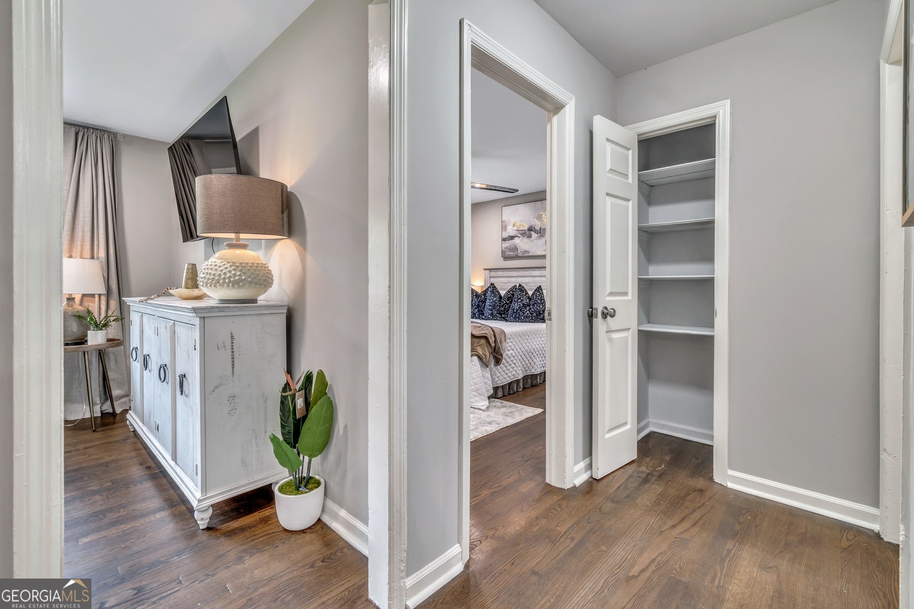 597 South Gordon Road Southwest Mableton, GA 30126 - Photo 21 of 25 an entryway with a room and wooden floor