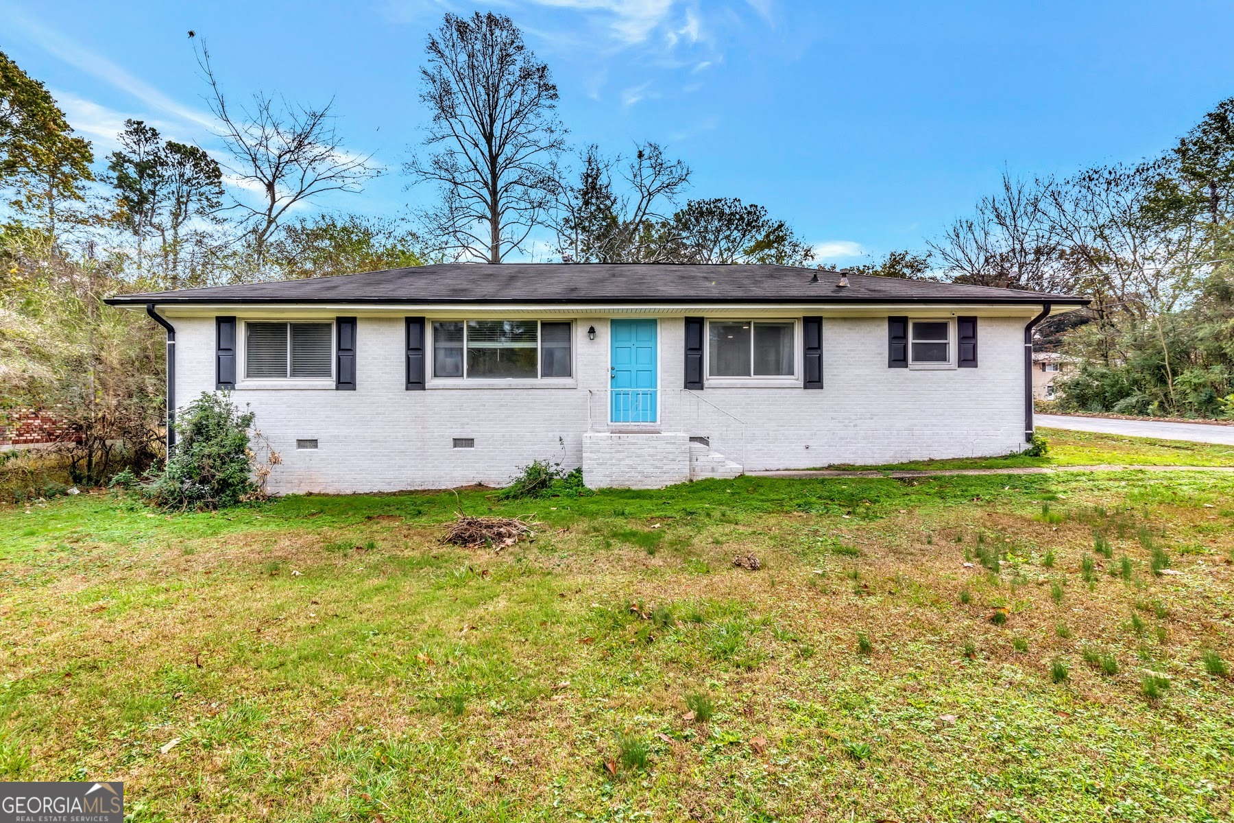 597 South Gordon Road Southwest Mableton, GA 30126 - Photo 24 of 25 a front view of house with yard and green space