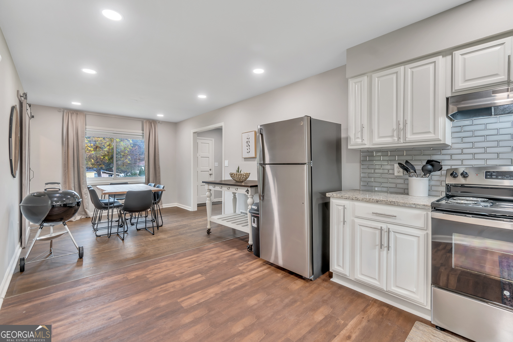 597 South Gordon Road Southwest Mableton, GA 30126 - Photo 8 of 25 a kitchen with sink cabinets and refrigerator