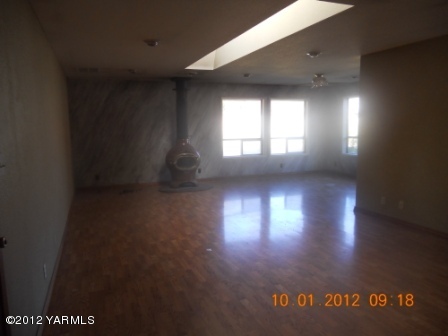 141 Ranger Road Naches, WA 98937 - Photo 3 of 6 a view of room with an empty space and a window