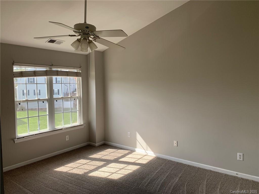 9730 Bailey Road Cornelius, NC 28031 - Photo 7 of 22 a view of an empty room with a window