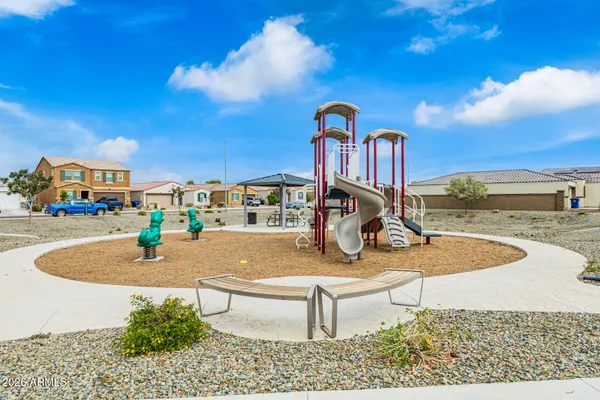 a view of swimming pool with outdoor seating