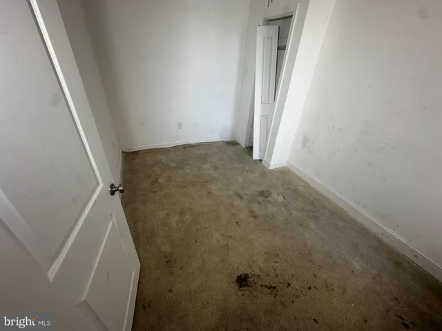 an empty room with a door