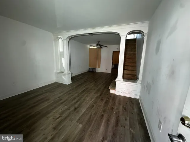 a view of entryway with wooden floor
