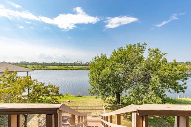 a view of a balcony next to a lake