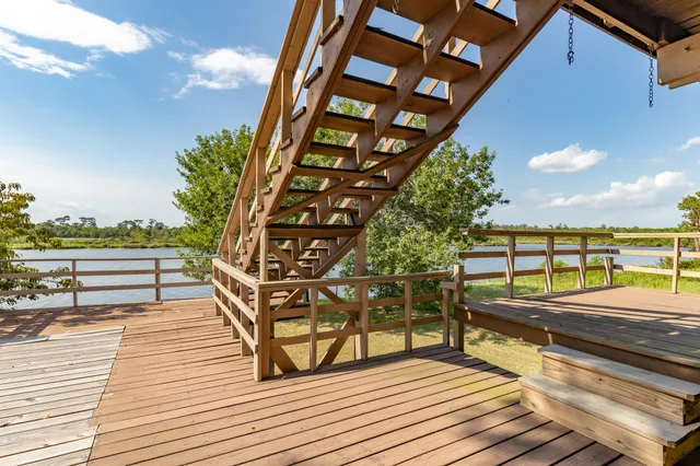 a balcony with wooden floor