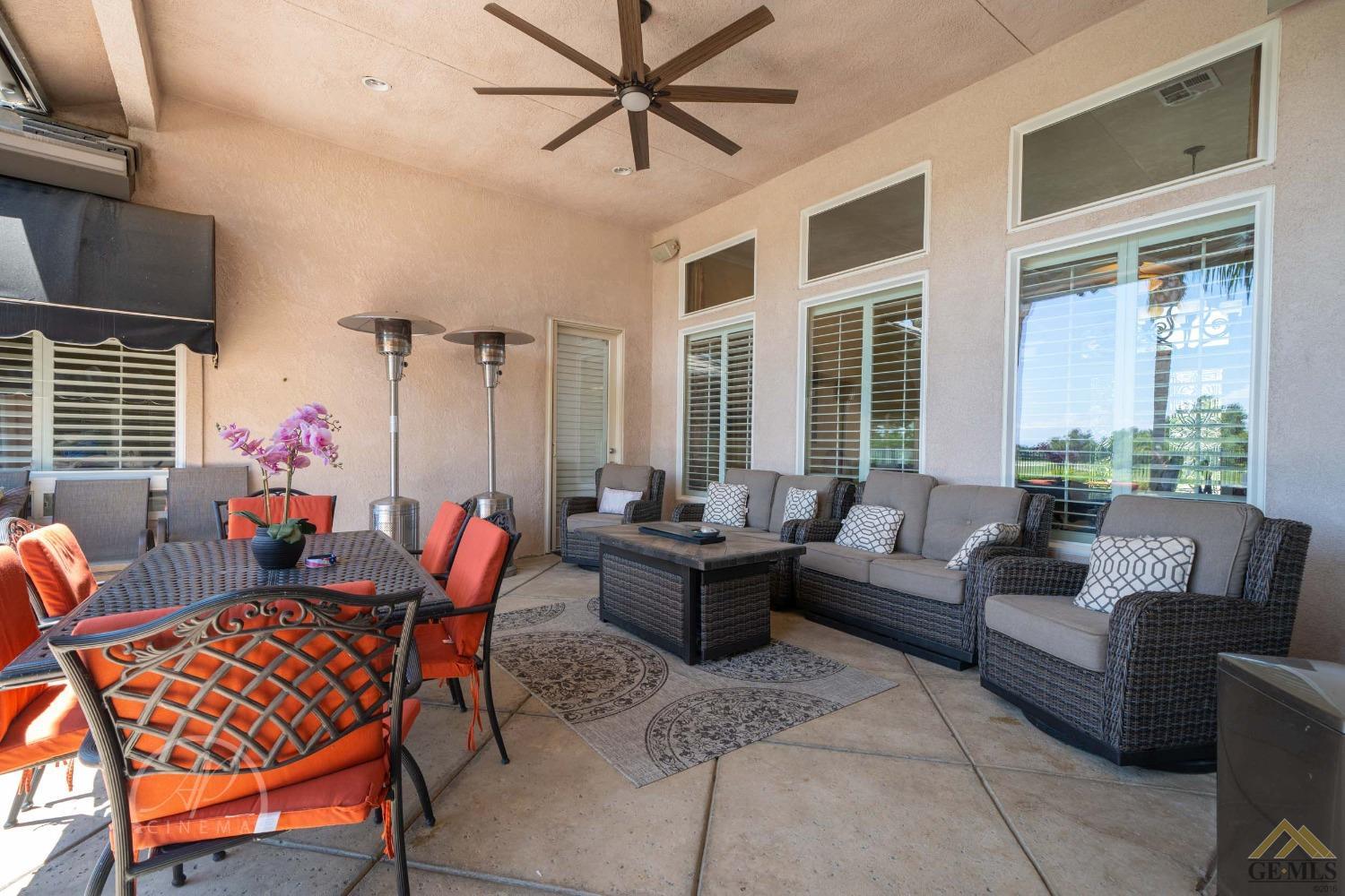 Undisclosed Address Bakersfield, CA 93311 - Photo 22 of 33 a living room with furniture and a large window