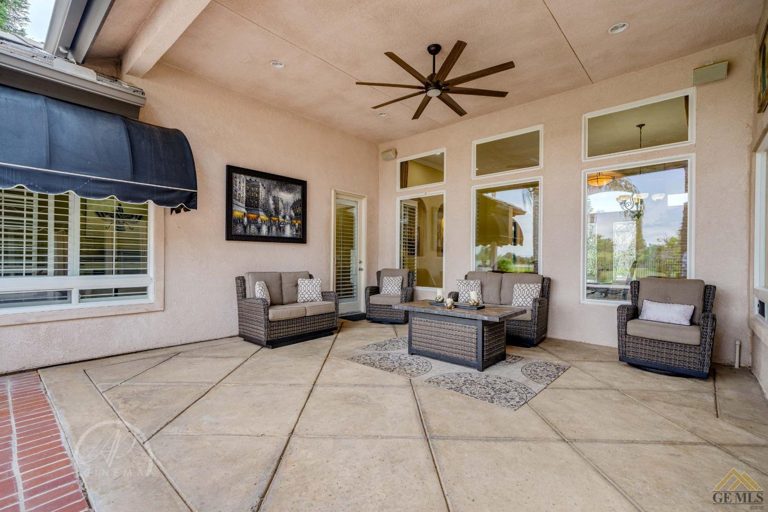 Undisclosed Address Bakersfield, CA 93311 - Photo 23 of 33 a living room with furniture and a large window