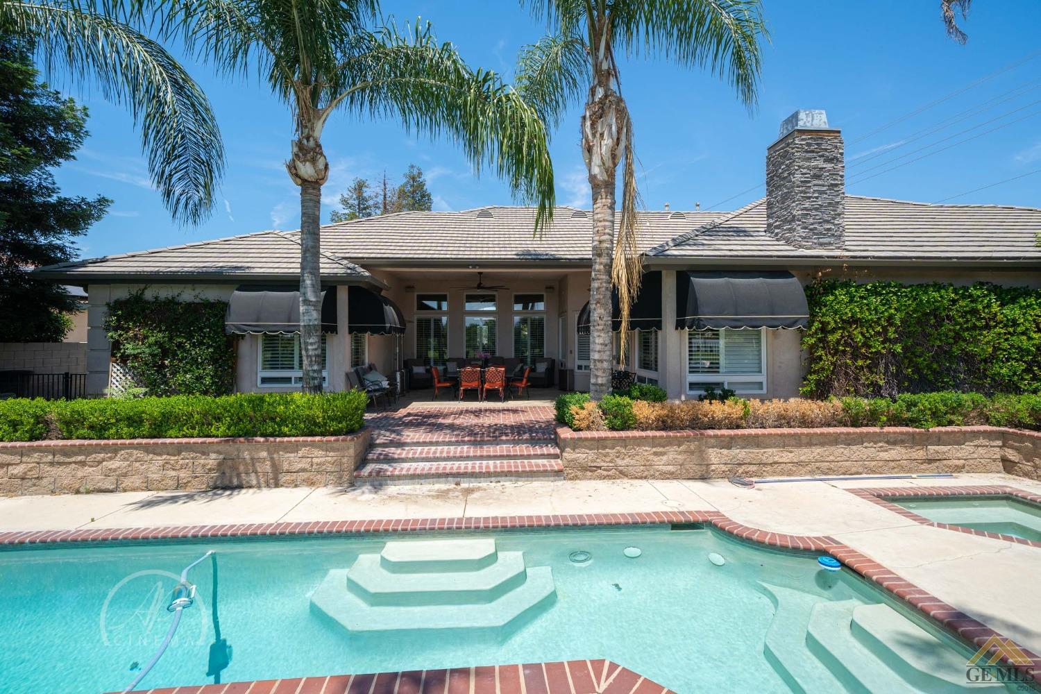 Undisclosed Address Bakersfield, CA 93311 - Photo 28 of 33 a view of a house with a swimming pool