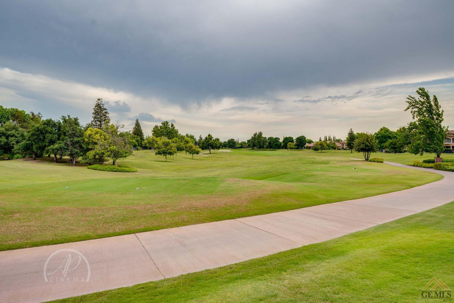 Undisclosed Address Bakersfield, CA 93311 - Photo 33 of 33 a view of a golf course with a lake