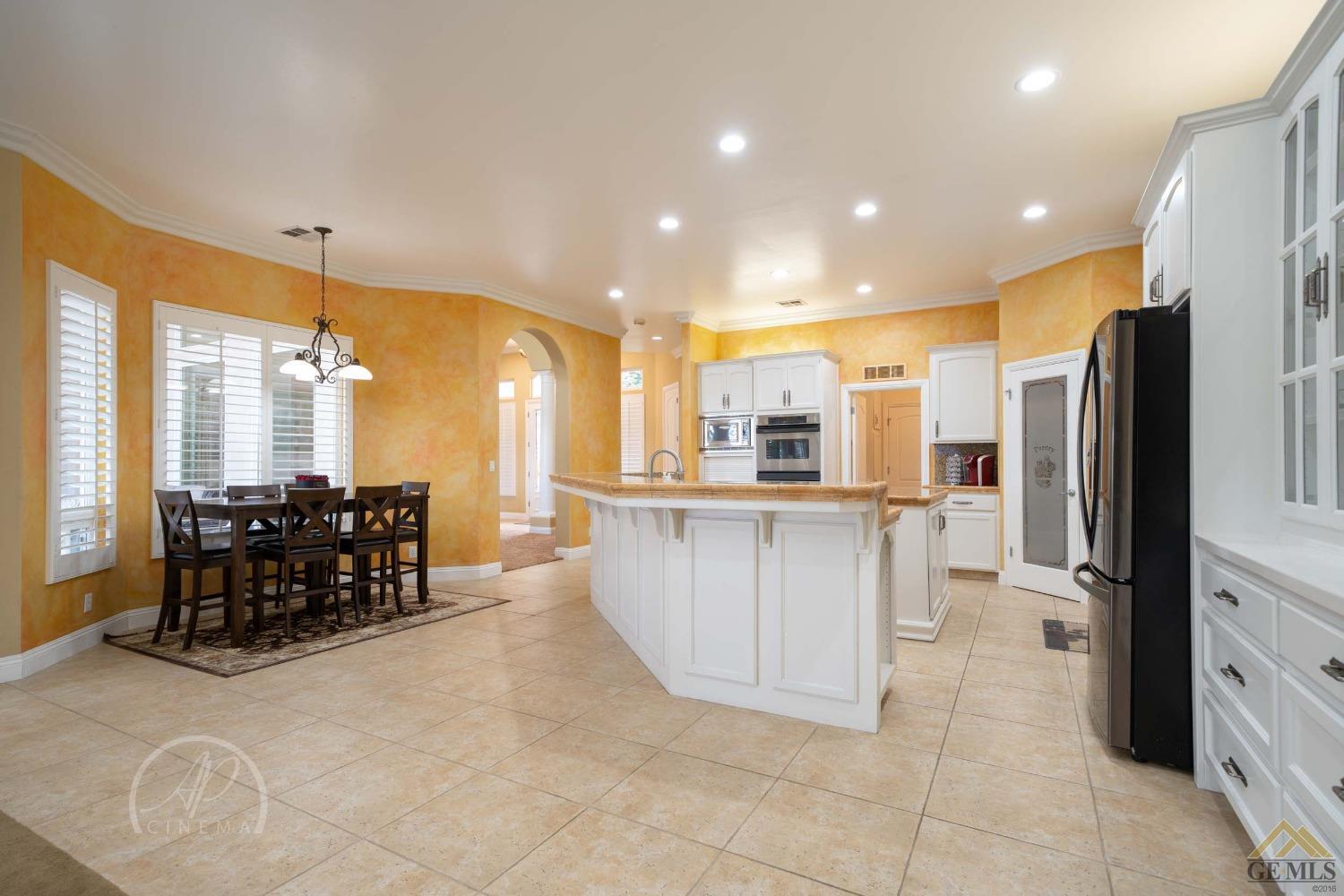 Undisclosed Address Bakersfield, CA 93311 - Photo 5 of 33 a kitchen with counter top space and refrigerator