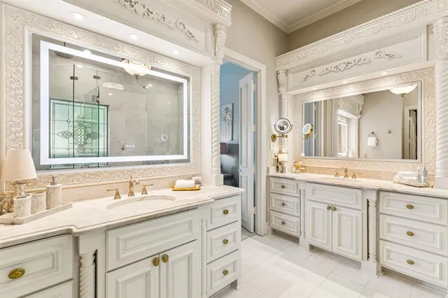 a spacious bathroom with a granite countertop sink mirror and double