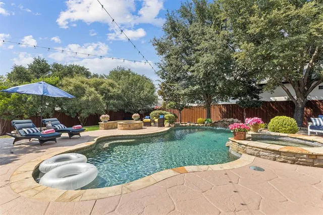 a childrens park with lots of swings and slides