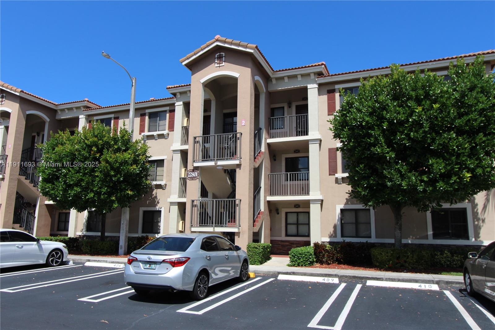 22801 Southwest 88th Place, Unit 205 Cutler Bay, FL 33190 - Photo 1 of 36 a building view