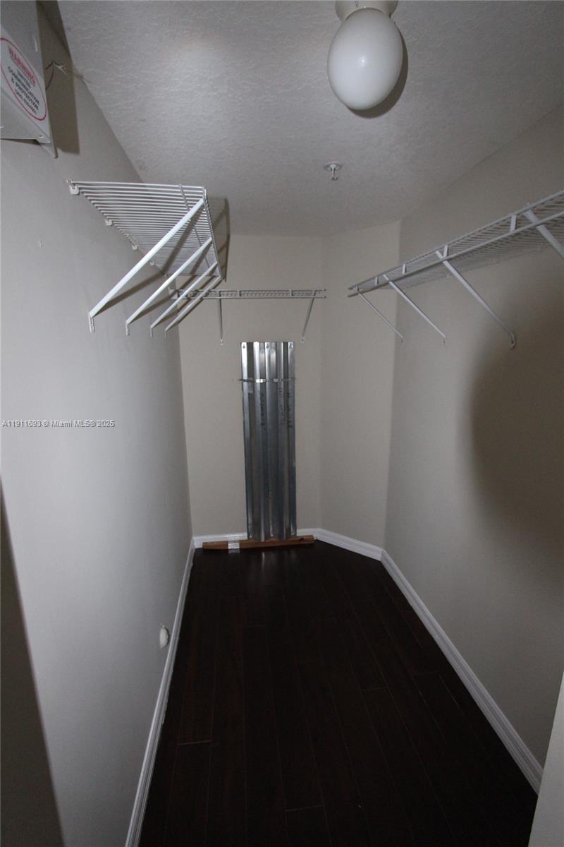 22801 Southwest 88th Place, Unit 205 Cutler Bay, FL 33190 - Photo 15 of 36 a view of a hallway