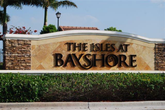 22801 Southwest 88th Place, Unit 205 Cutler Bay, FL 33190 - Photo 23 of 36 a street sign on a wall with wall