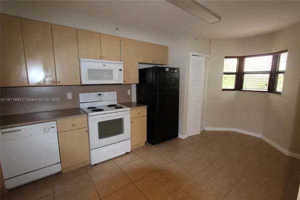 a close up view of washer and dryer with washer and dryer